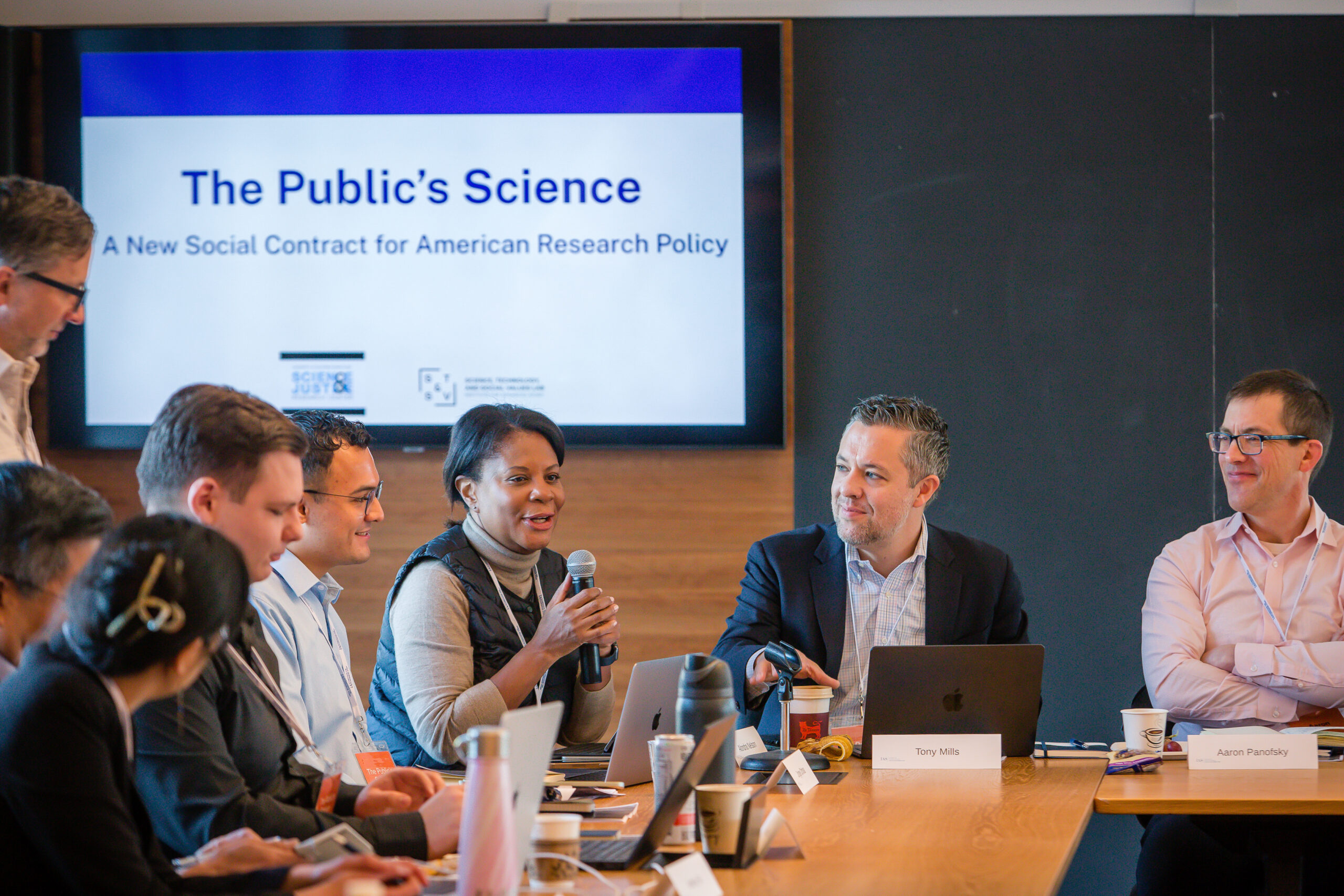 Alondra Nelson holds a mic and speaks amongst other participants at the Public's Science launch event