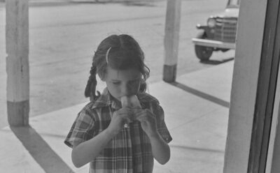 Young girl eating a popsicle in Monticello