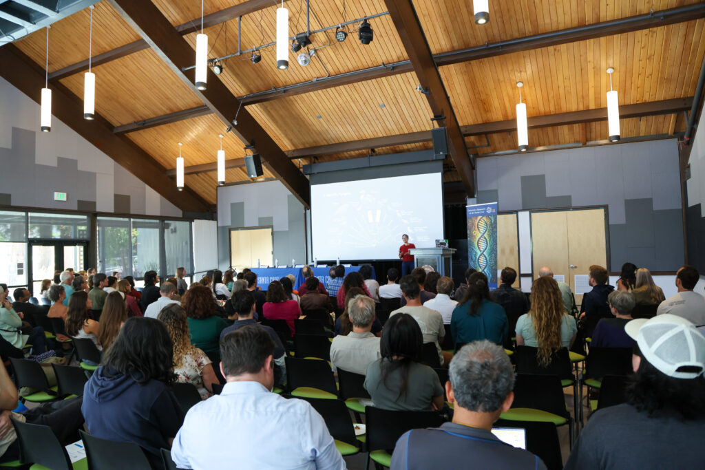A packed room listening to Beth Shapiro