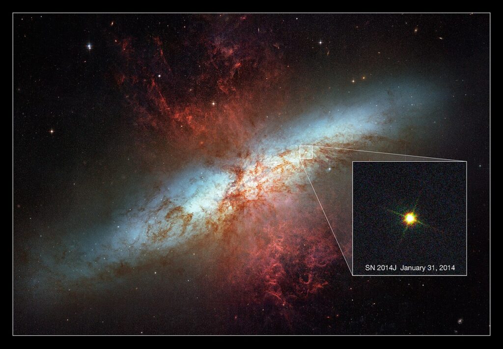 Mosaic of galaxy with inset image of supernova