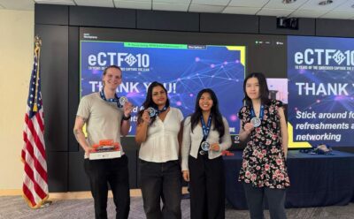 Four students show off 2nd place medals around their necks