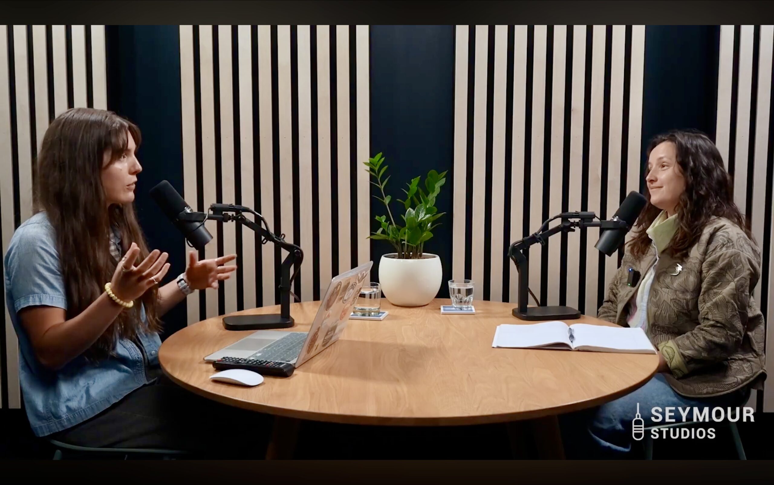 Podcast host and guest recording in studio