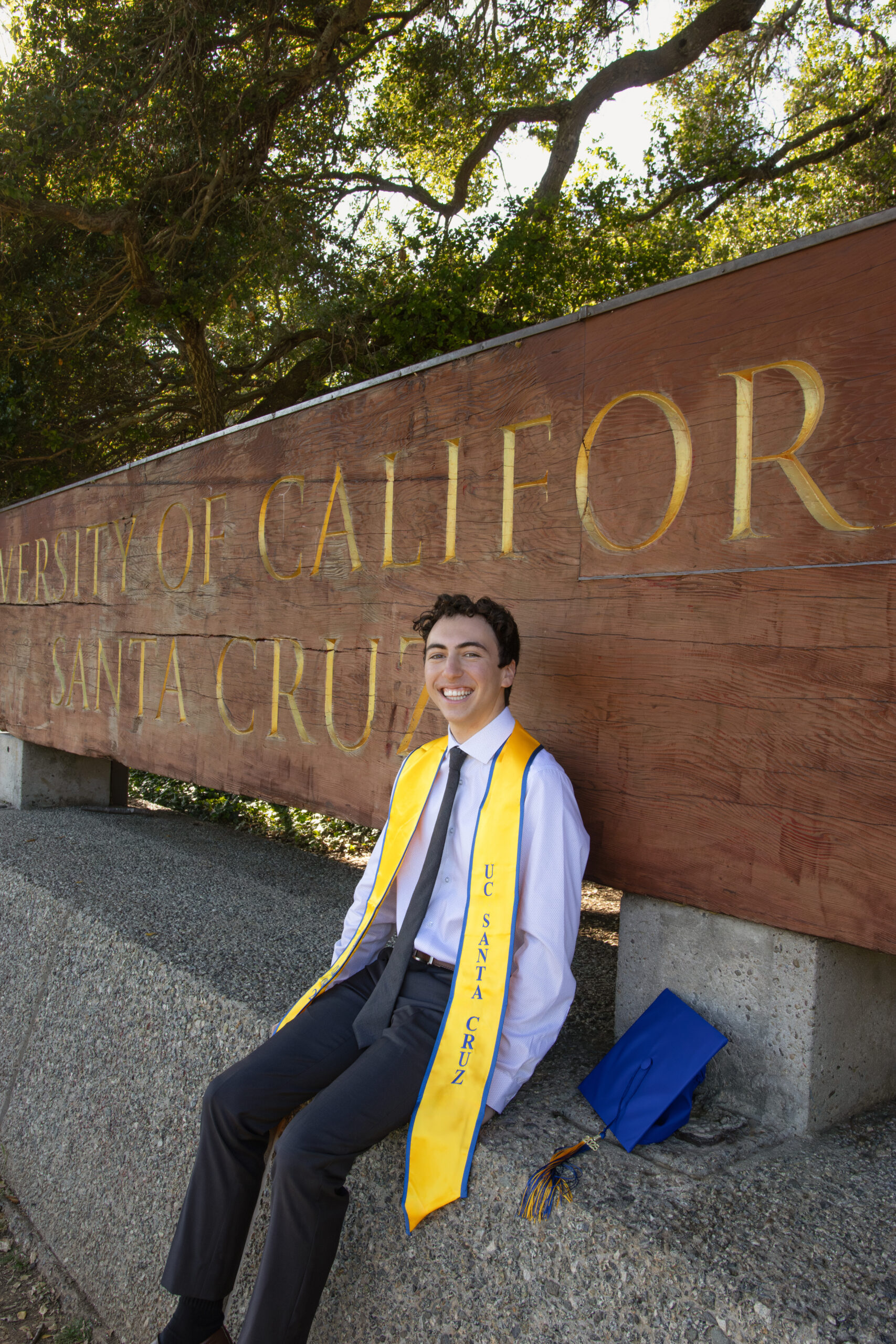 Max Deneroff at the UC Santa Cruz entrance sign.
