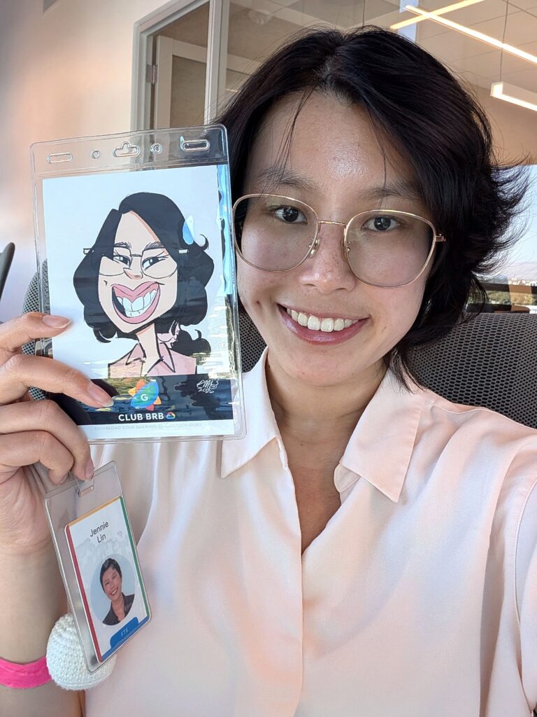 Jennie Lin holds badge at Google office