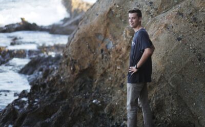 Portrait of Tim Vorenkamp standing on the shore