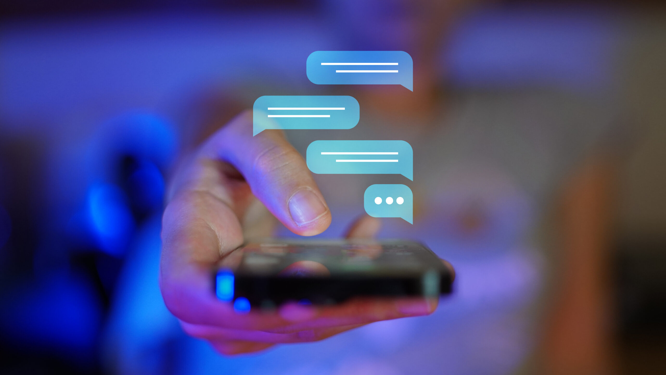Hand showing a mobile phone towards camera viewpoint, digital overlay of messaging screen