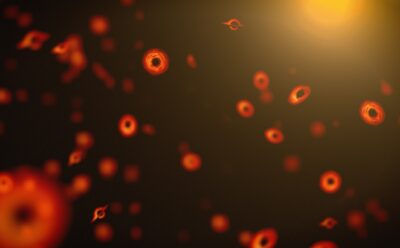 Illustration of small black holes with reddish accretion discs scattered in space