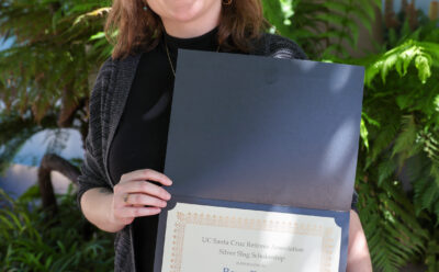 Roxy Davis holds a certificate from the Retirees Association Scholarship Event