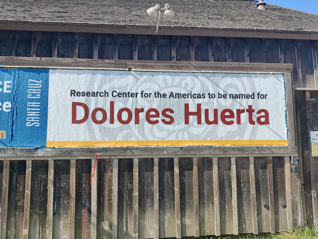 A sign on the UC Santa Cruz barn announces the naming of the Huerta Center