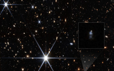 Stars and galaxies appear as twinkles and points of light in space