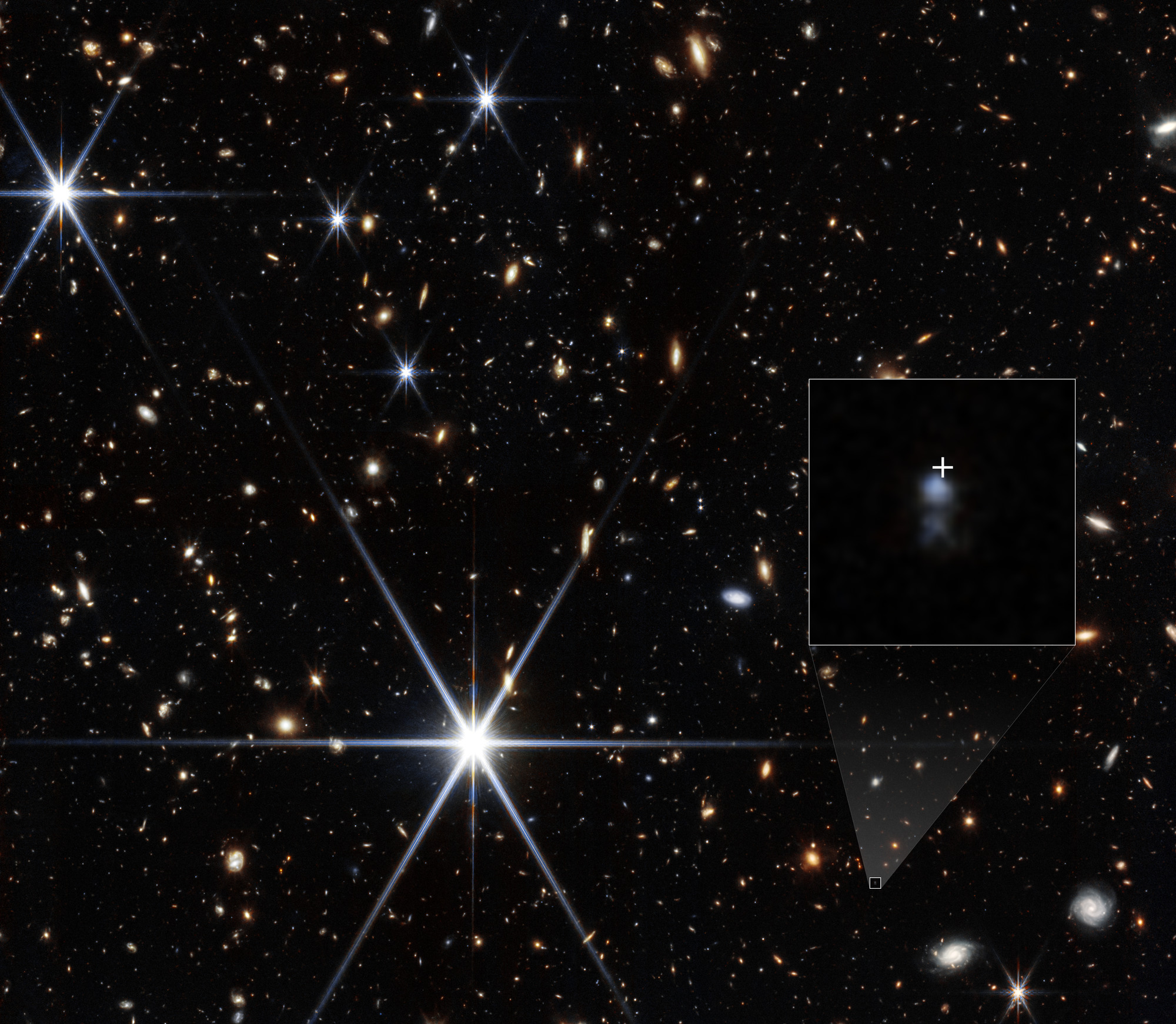 Stars and galaxies appear as twinkles and points of light in space